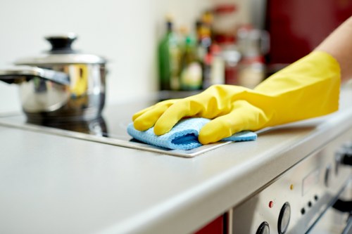 Cleaner preparing a property for a regular cleaning appointment in W2